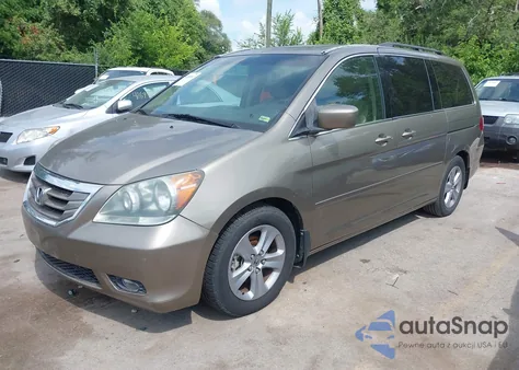 2010 Honda Odyssey Touring из США, поврежденный, VIN 5FNRL3H99AB047551